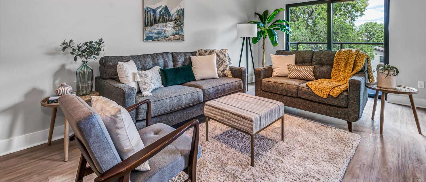 Living room with Orange Throw
